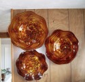 red and amber set of 3 wall platters