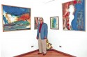 Artist Mohsen Attya in his exhibition